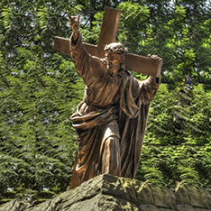 large brass jesus carrying the cross statue